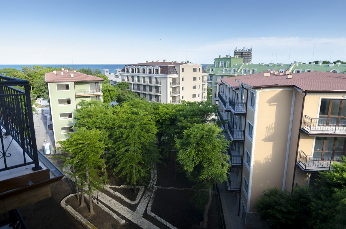 Panoramic balcony view of Saints Constantine and Helena with sea and green landscape